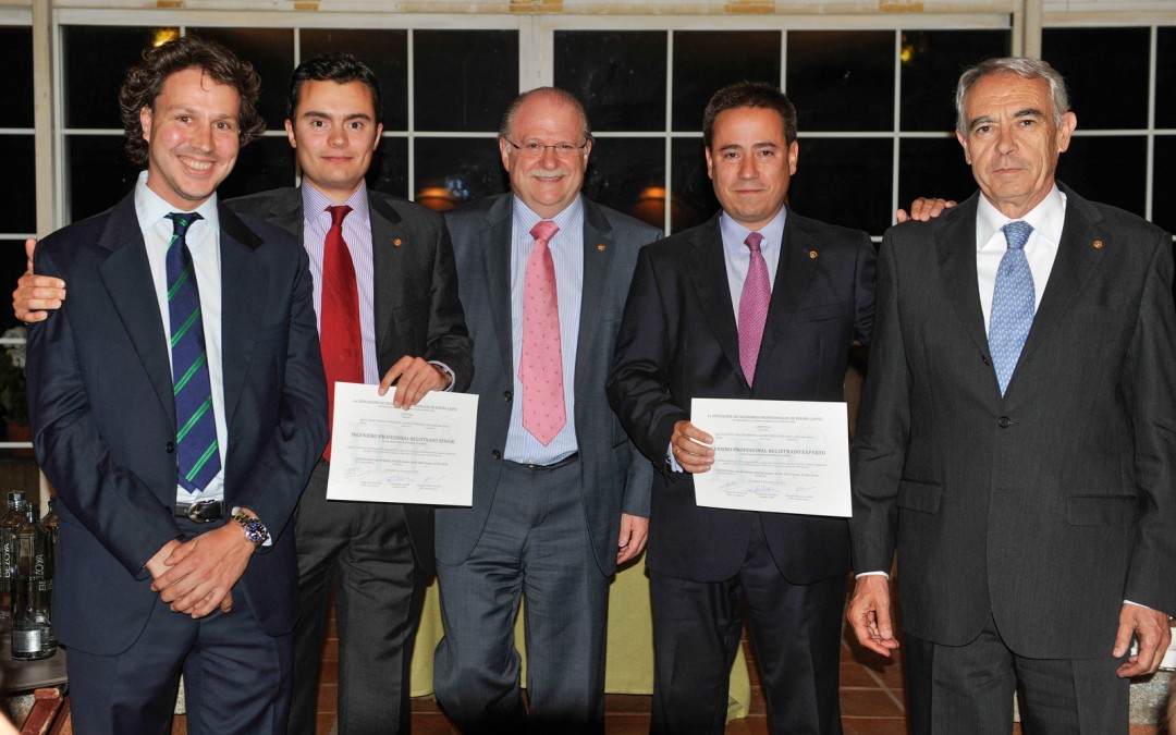 Isaac Prada and José María Cancer receive their titles as registered professional engineers during the welcome ceremony of the 2014 graduates of ICAI engineering school